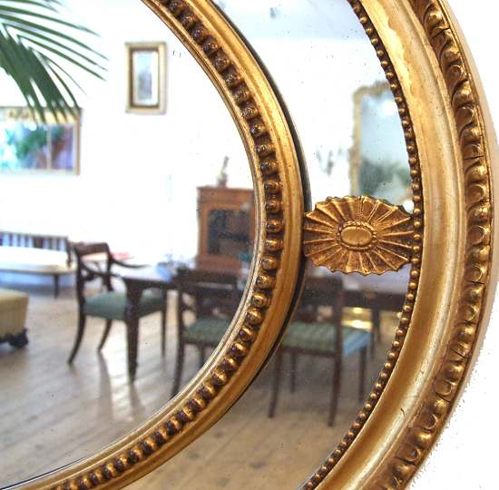 Regency style Edwardian oval gilt mirror