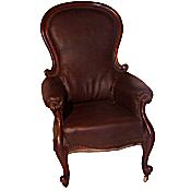 Victorian faux leather spoonback armchair