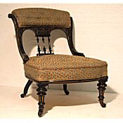 edwardian ebonised and gilt nursing chair
