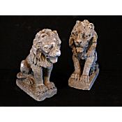 pair of matching decorative lions of small dimensions