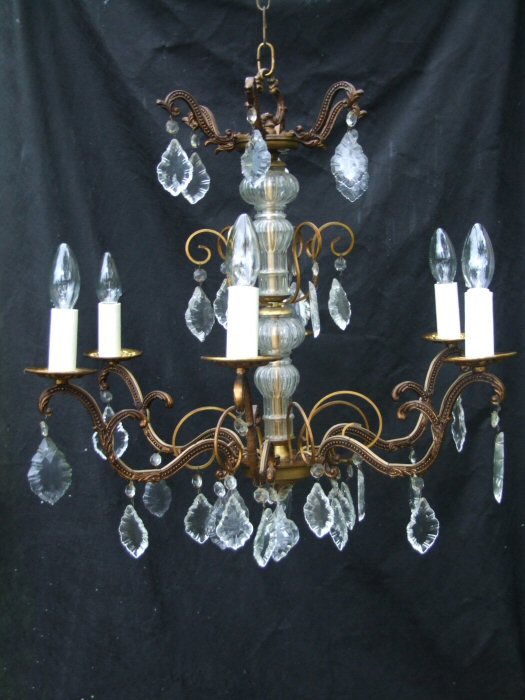 Circa 1900 A 6 arm patinated Brass and Crystal Chandelier 