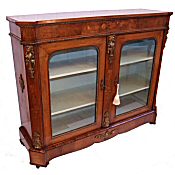 Victorian figured walnut double pier cabinet