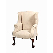 antique wing armchair on ball and claw feet