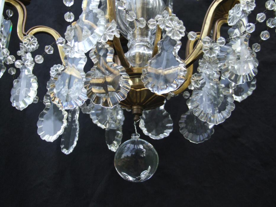 Circa 1900 A 5 arm Brass and Crystal Chandelier 