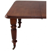 W1vth mahogany extending dining table