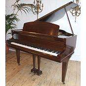 antique baby grand piano