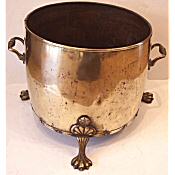 large antique brass log bin