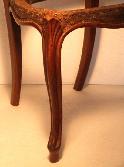 Four Victorian walnut balloon back dining chairs