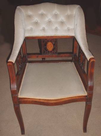 An Edwardian open armchair circa 1900