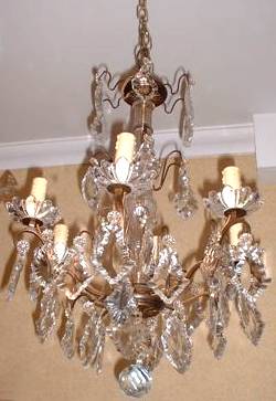 6 arm chandelier with dainty brass arms 