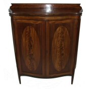 Edwardian inlaid serpentine front cabinet