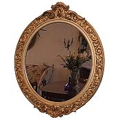 Antique oval gilt mirror
