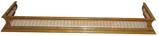 Antique fire fender in brass