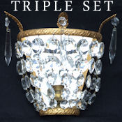 Set of three antique mirror back wall lights